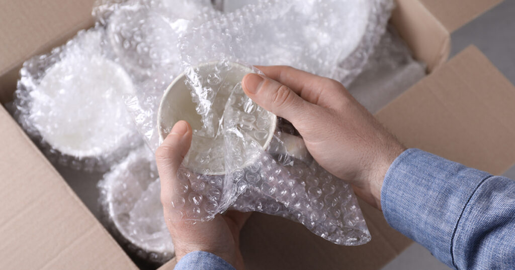 packing dishes with bubble wrap