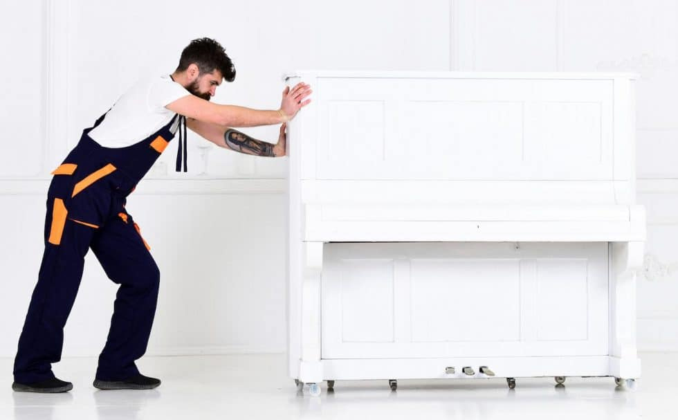 mover moving a piano