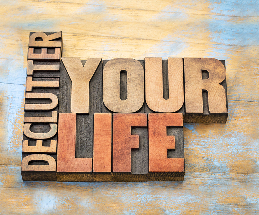 woodblock sign stating Declutter Your Life